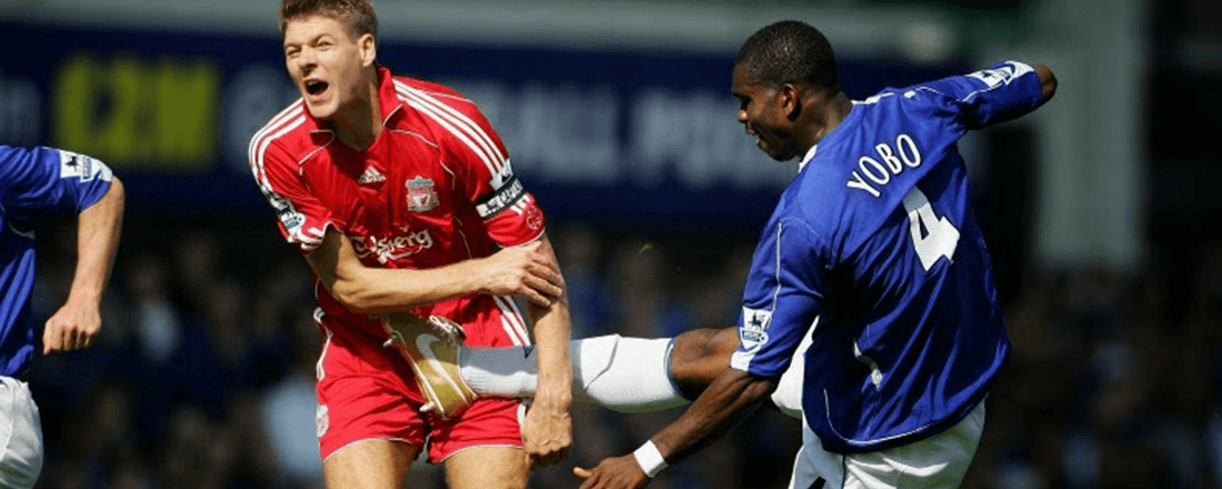 Steven Gerrard and Joseph Yobo during the Merseyside derby between Liverpool FC and Everton FC (Source: Football Off the Pitch)