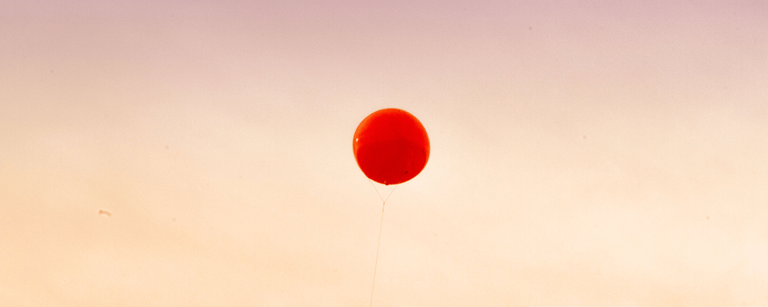 Red Balloon Floating Away